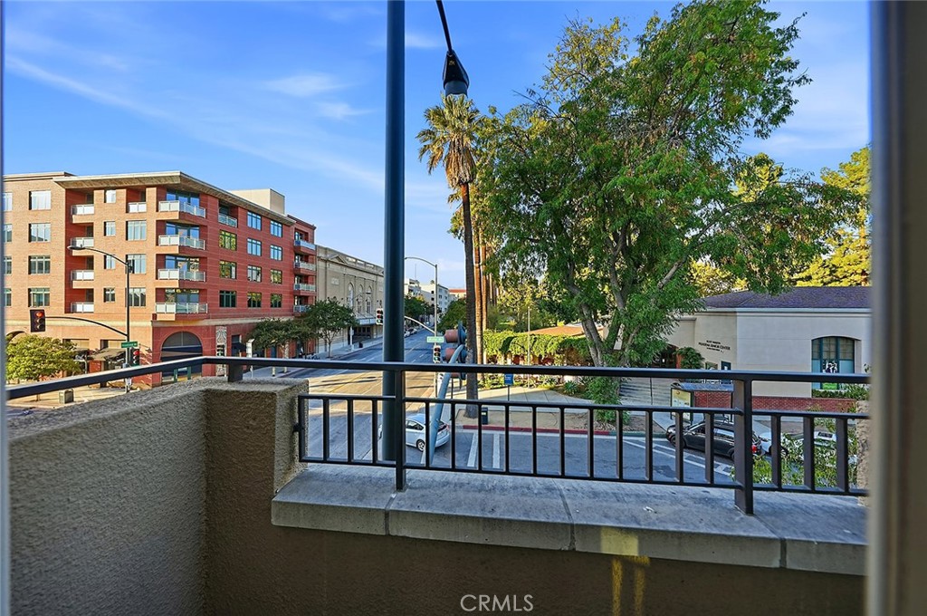 80 North Raymond Avenue, Unit 212 Pasadena, CA 91103 - Photo 21 of 24 a view of a balcony with a lake view