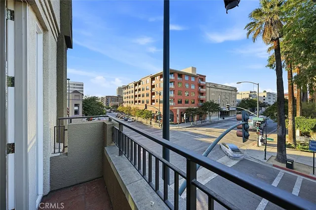 a view of a balcony with city view
