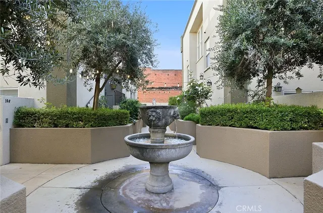 a view of a swimming pool with a fountain