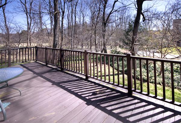 676 Lowell Road Concord, MA 01742 - Photo 14 of 18 a balcony with wooden floor