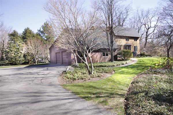 676 Lowell Road Concord, MA 01742 - Photo 3 of 18 a view of a house with a yard