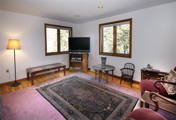 676 Lowell Road Concord, MA 01742 - Photo 4 of 18 a living room with furniture rug and a window