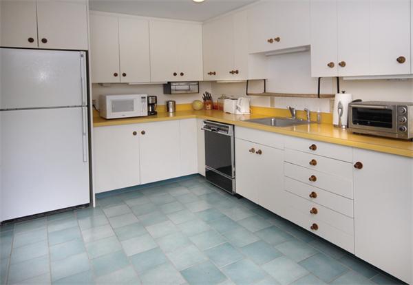 676 Lowell Road Concord, MA 01742 - Photo 6 of 18 a kitchen with cabinets stainless steel appliances and a counter space