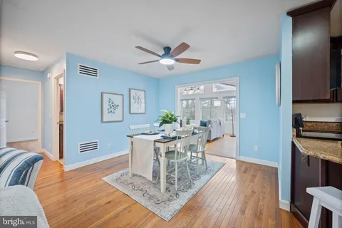 a kitchen with stainless steel appliances granite countertop a stove a sink dishwasher and a refrigerator