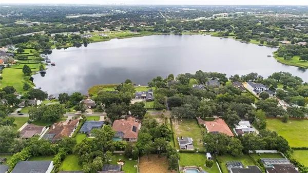 an aerial view of city and lake view