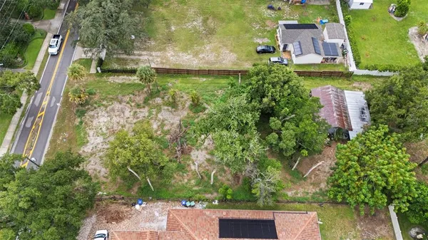 an aerial view of residential house with outdoor space
