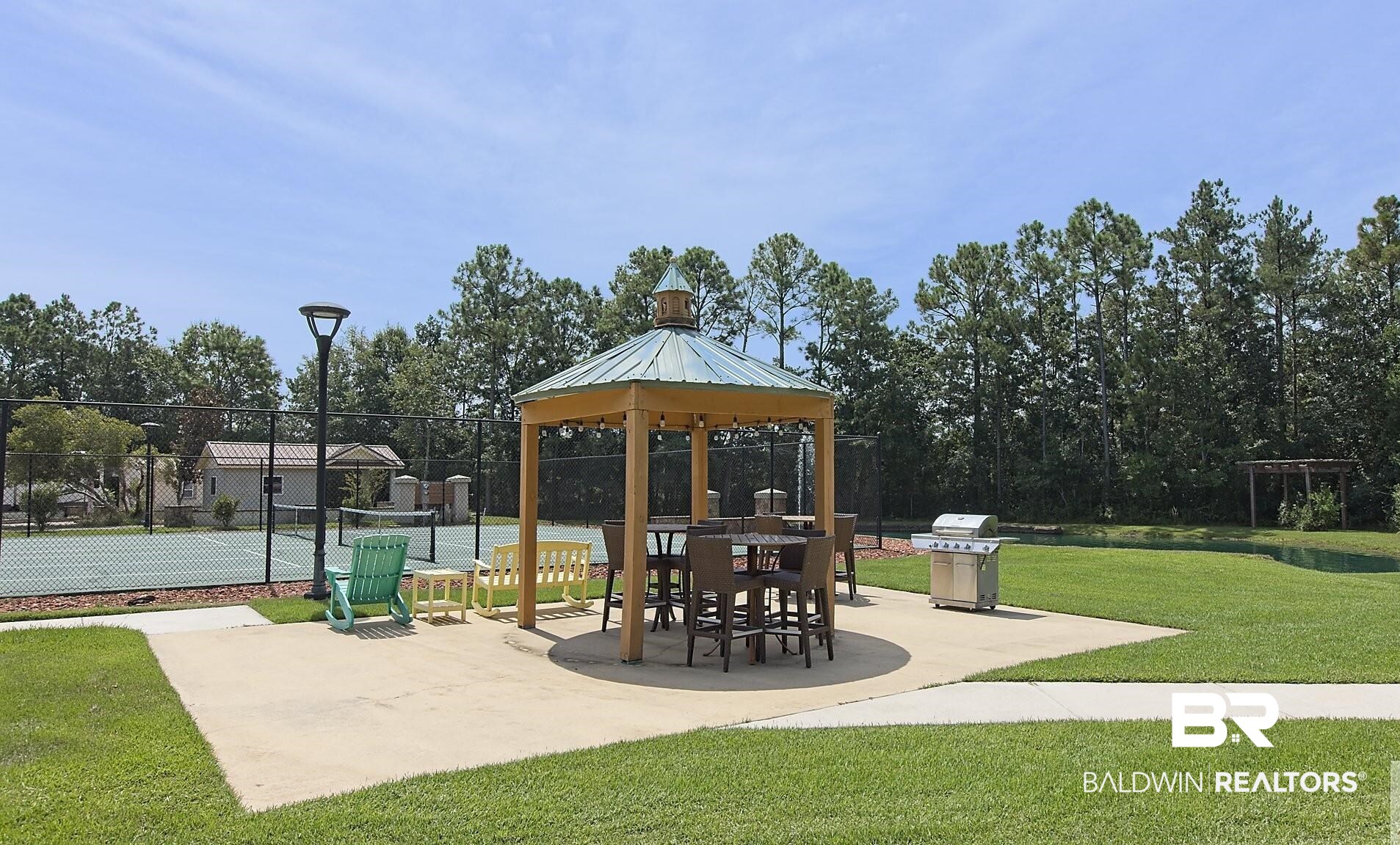 28238 Migratory Way Elberta, AL 36530 - Photo 49 of 58 Surrounding community featuring a patio, a gazebo, and a tennis court