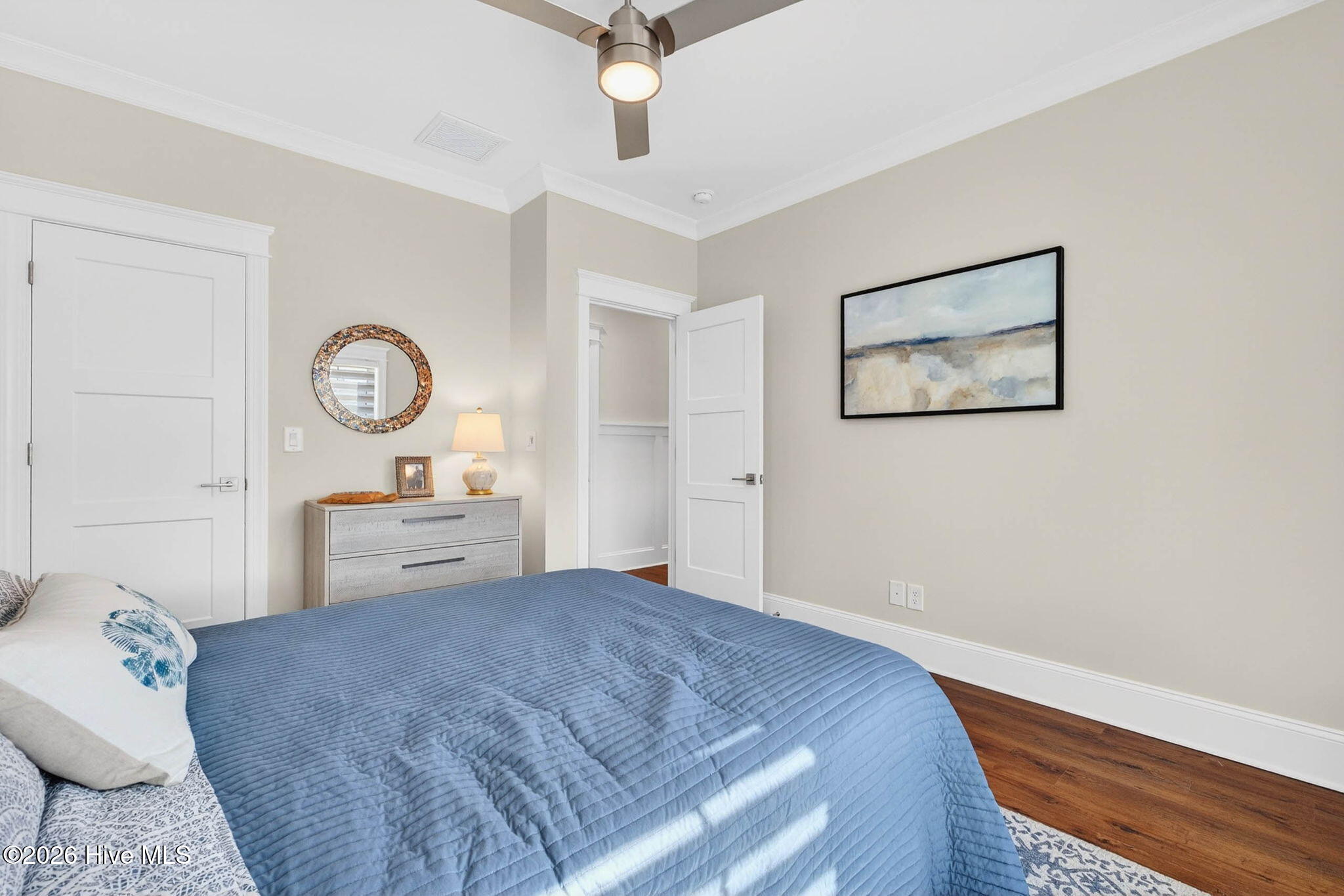 1416 Riverside Drive Sunset Beach, NC 28468 - Photo 46 of 83 Comfortable bedroom with soft lighting and inviting coastal feel.