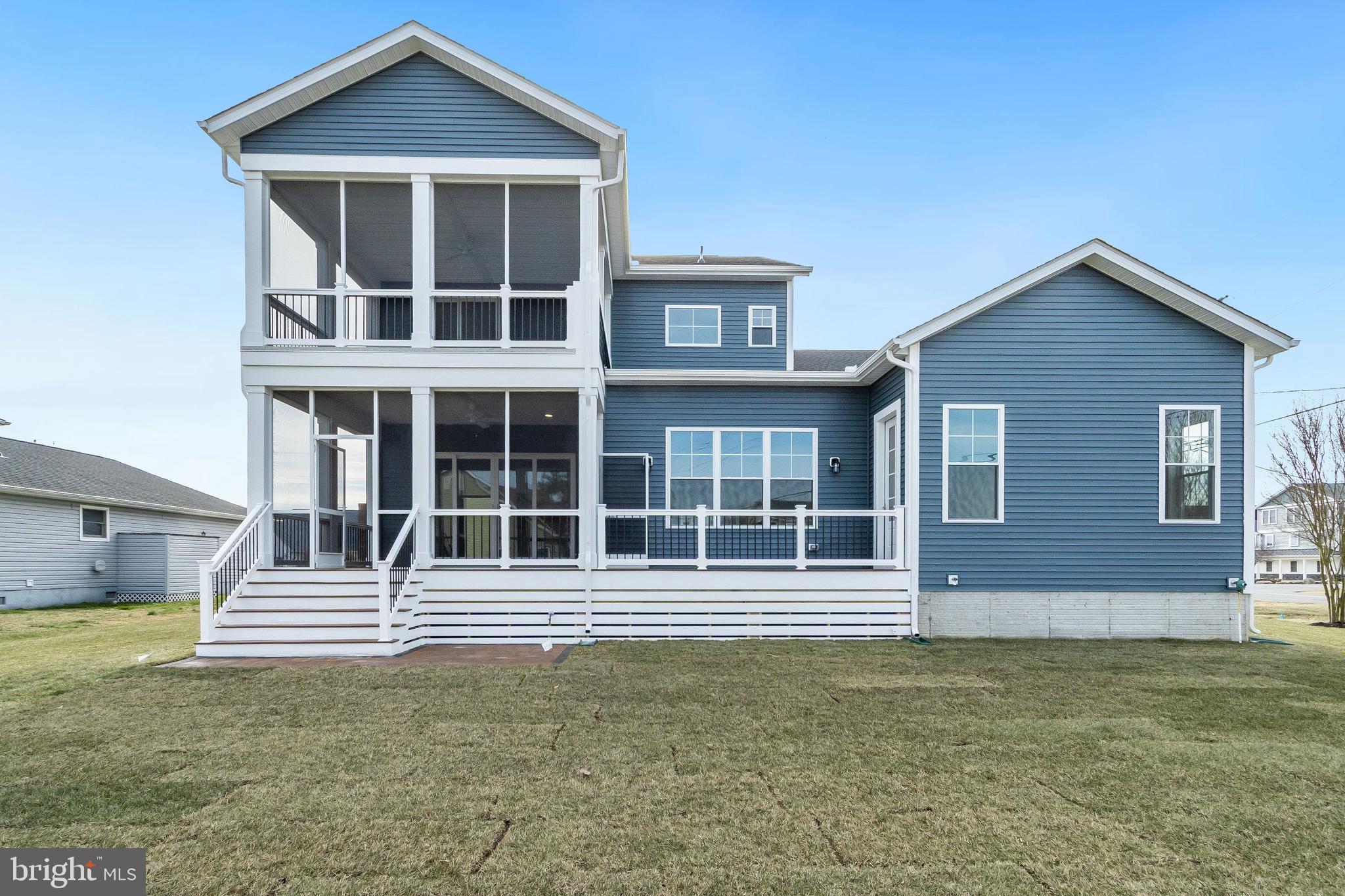 37828 Cedar Road Selbyville, DE 19975 - Photo 102 of 109 a front view of a house with a garden