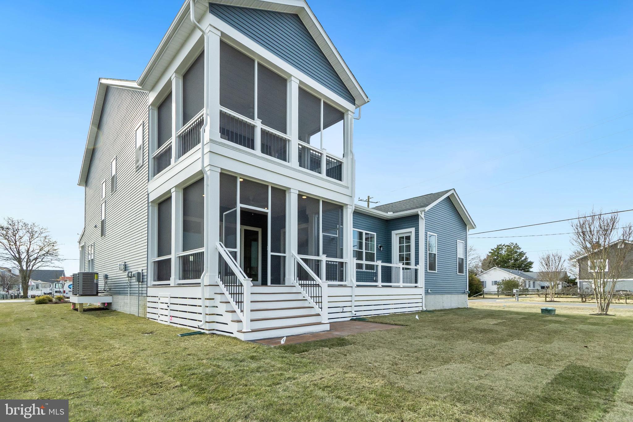 37828 Cedar Road Selbyville, DE 19975 - Photo 103 of 109 a view of a house with a yard