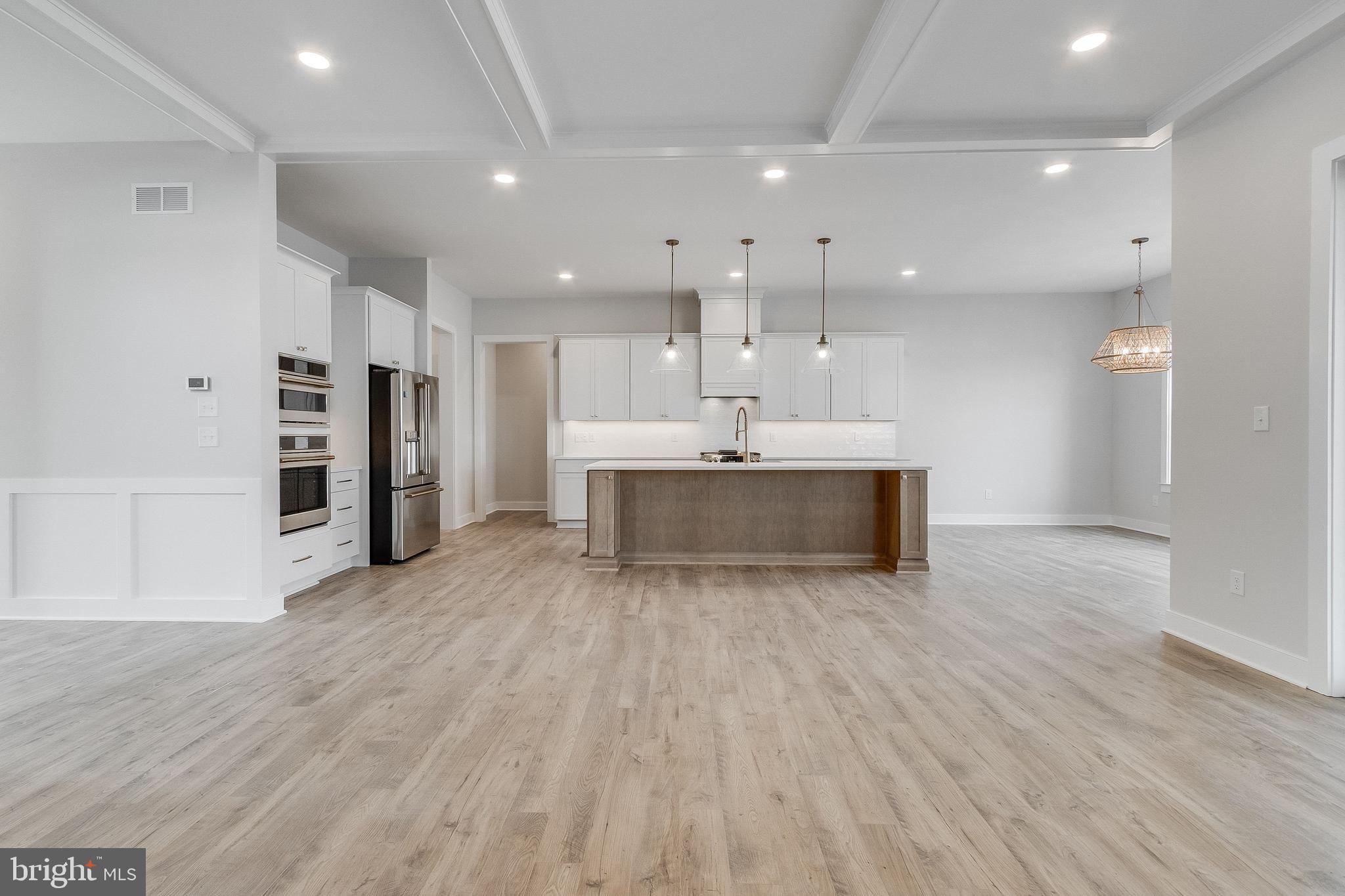 37828 Cedar Road Selbyville, DE 19975 - Photo 38 of 109 Living Area with gas fireplace and built-ins