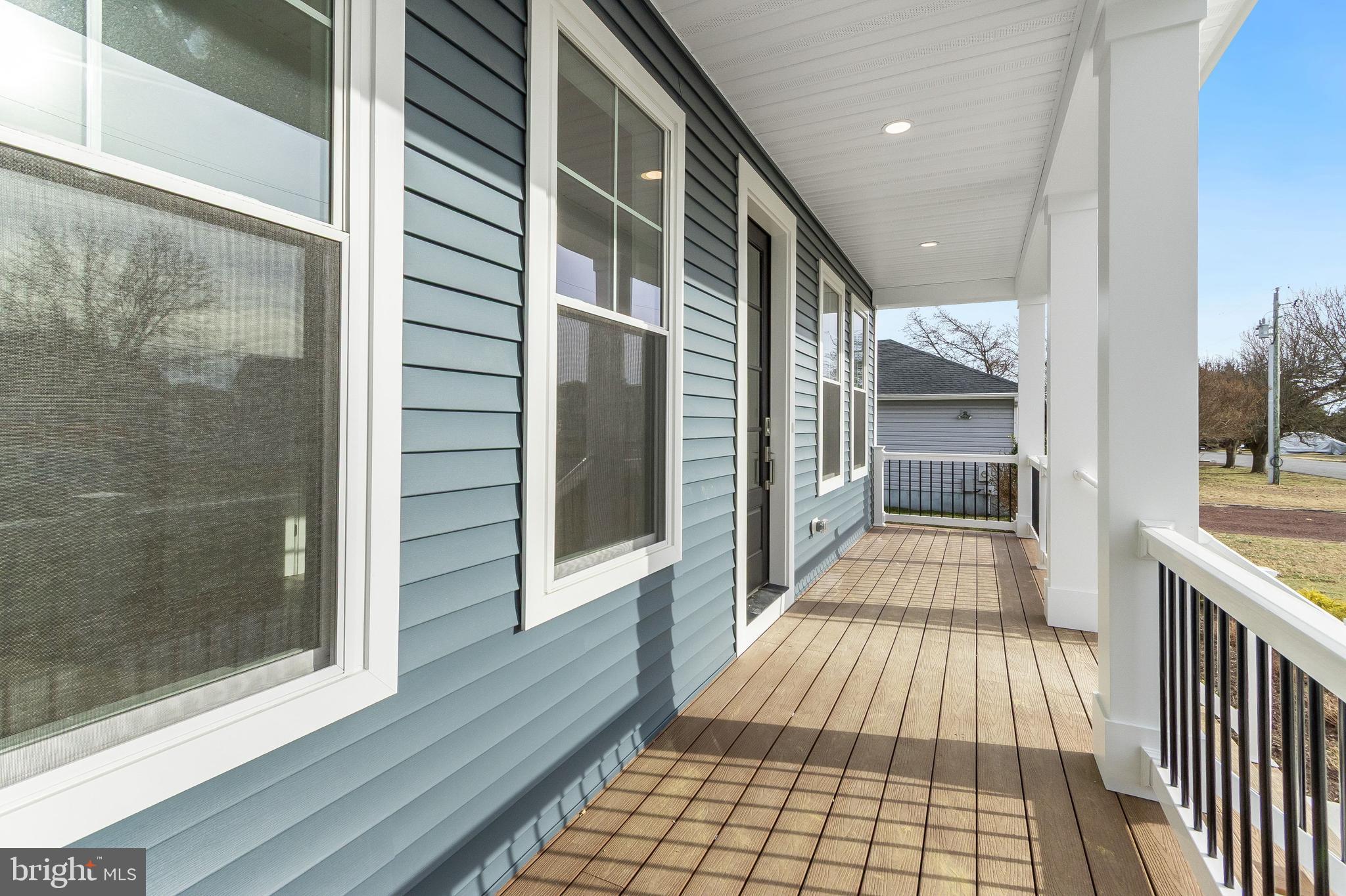 37828 Cedar Road Selbyville, DE 19975 - Photo 8 of 109 Wide front Porch with Canal View