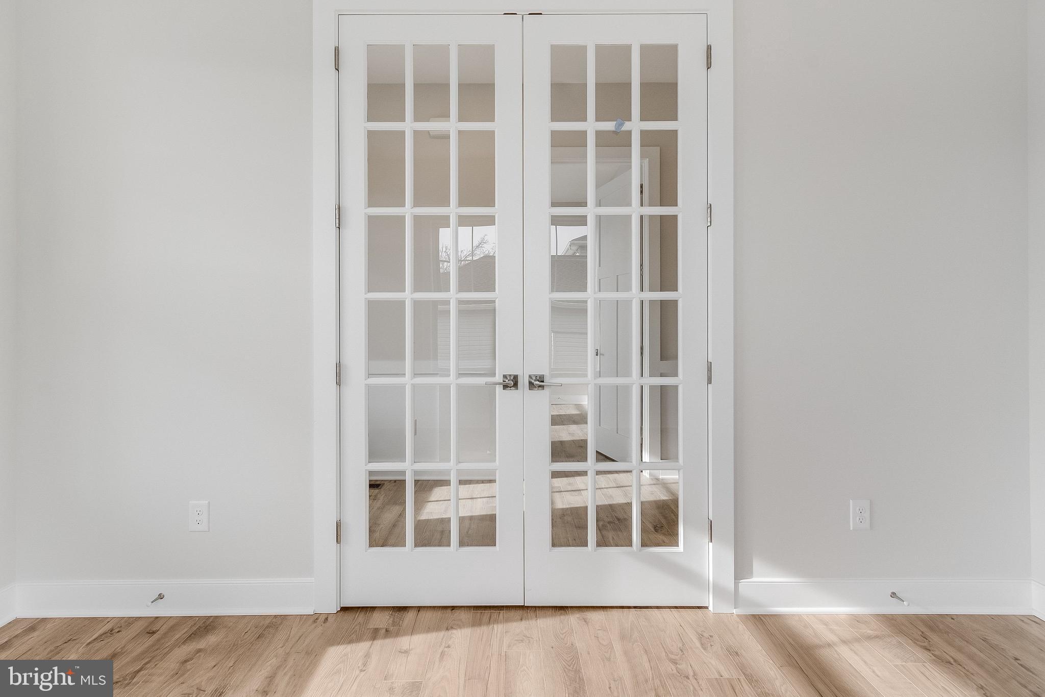 37828 Cedar Road Selbyville, DE 19975 - Photo 9 of 109 a view of an empty room with a window