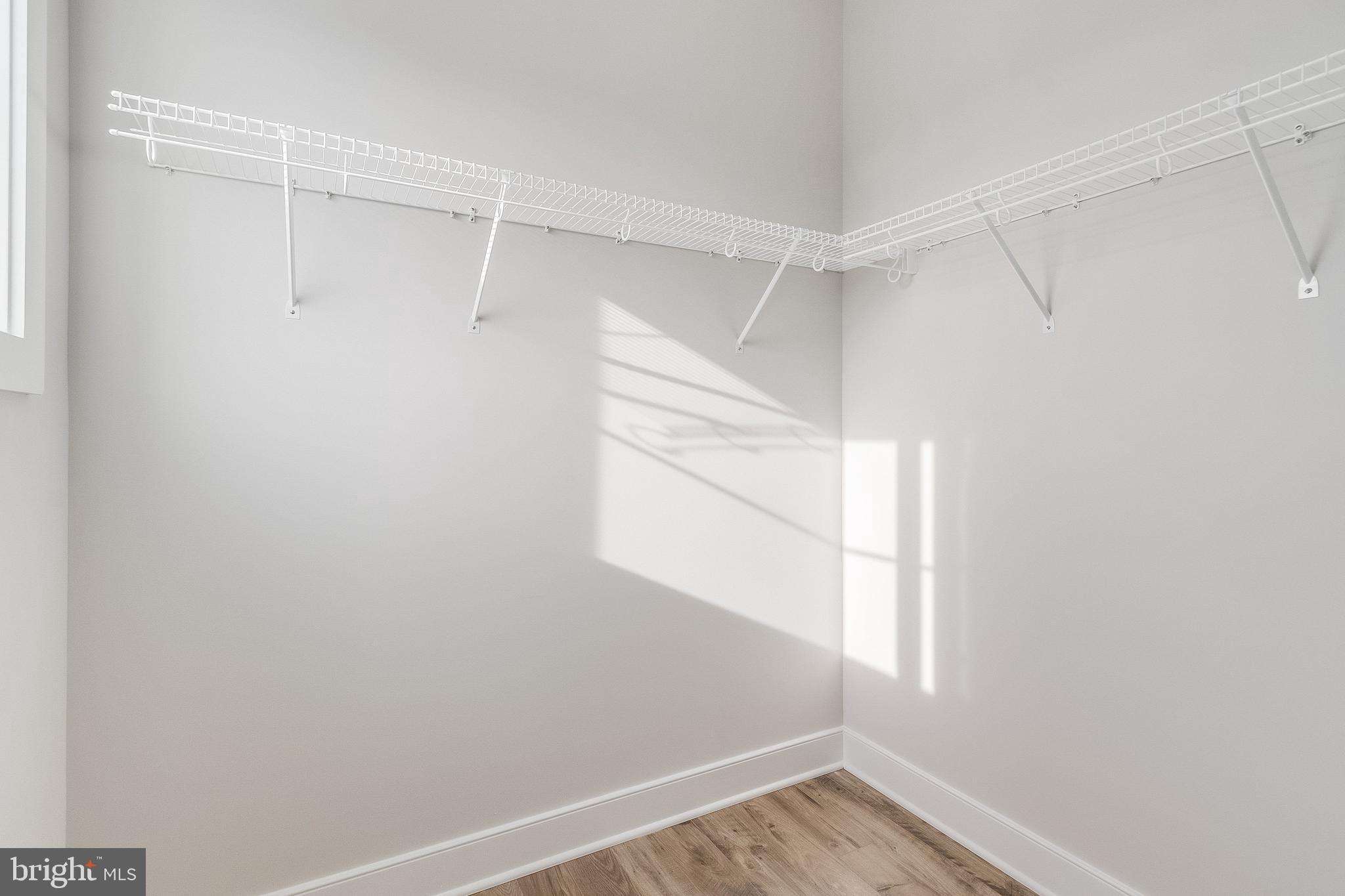 37828 Cedar Road Selbyville, DE 19975 - Photo 92 of 109 a view of an empty walk in closet