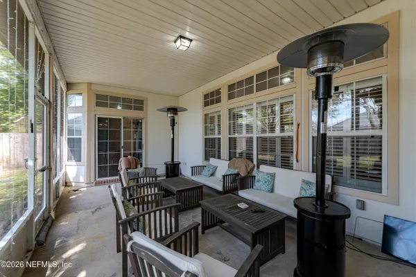 a outdoor dining space with furniture