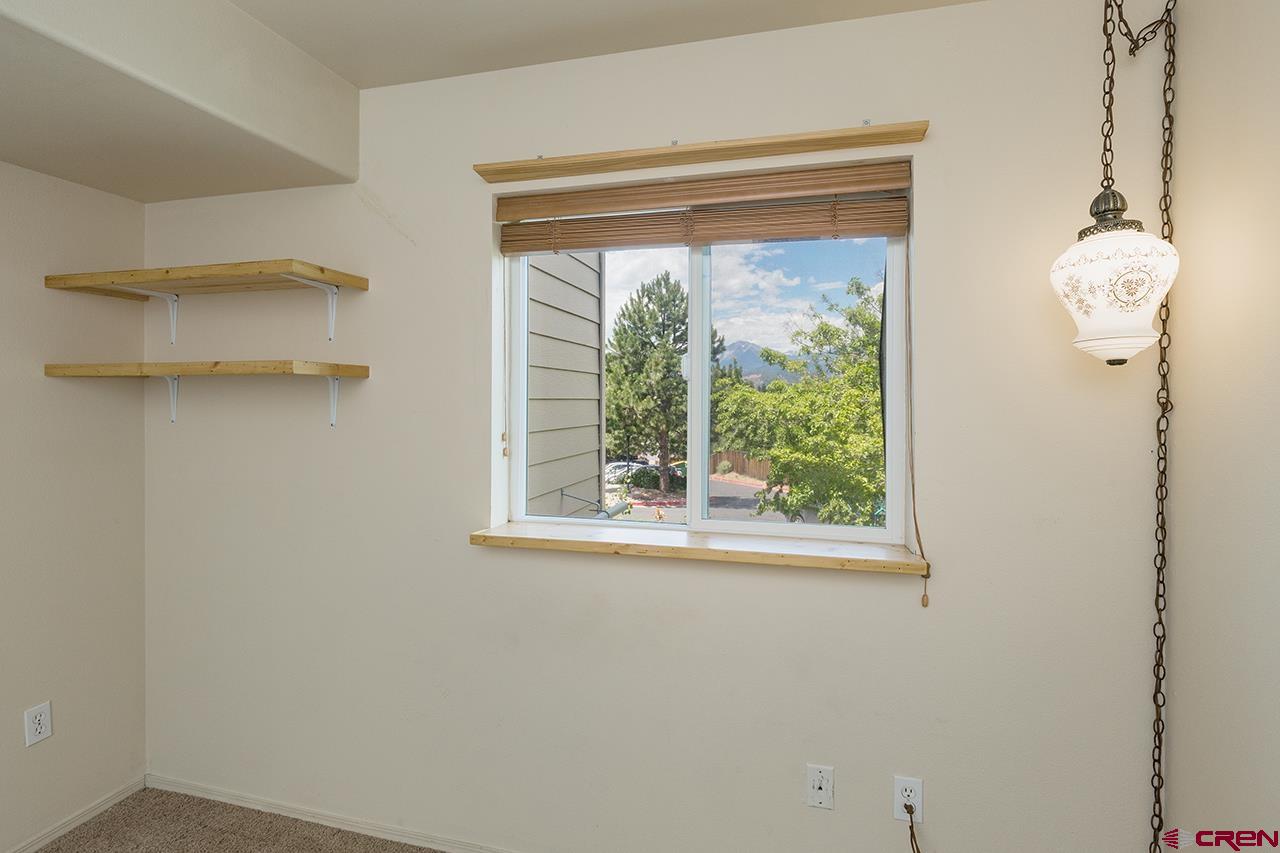 1100 Goeglein Gulch Road, Unit 167 Durango, CO 81301 - Photo 14 of 20 a view of a small space with a window