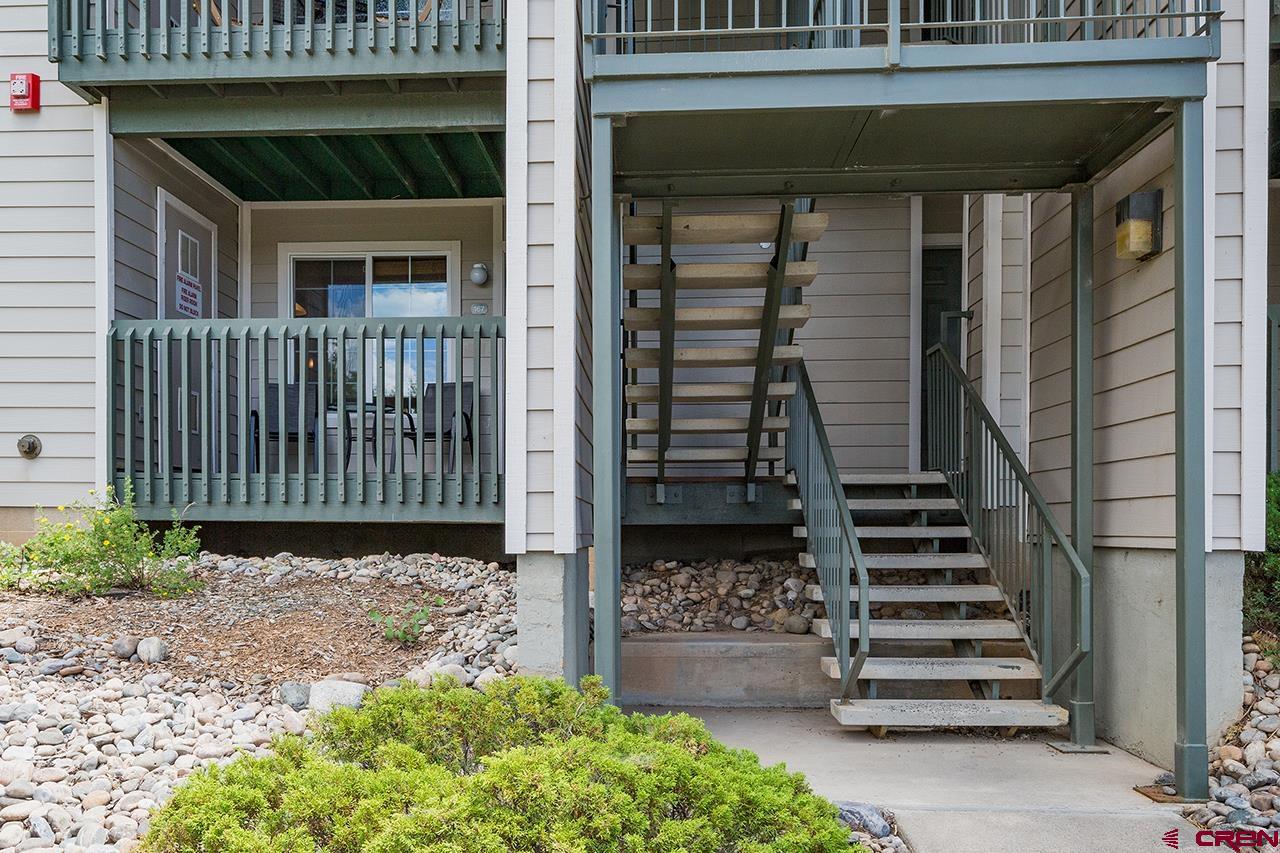 1100 Goeglein Gulch Road, Unit 167 Durango, CO 81301 - Photo 3 of 20 front view of a house with a stairs