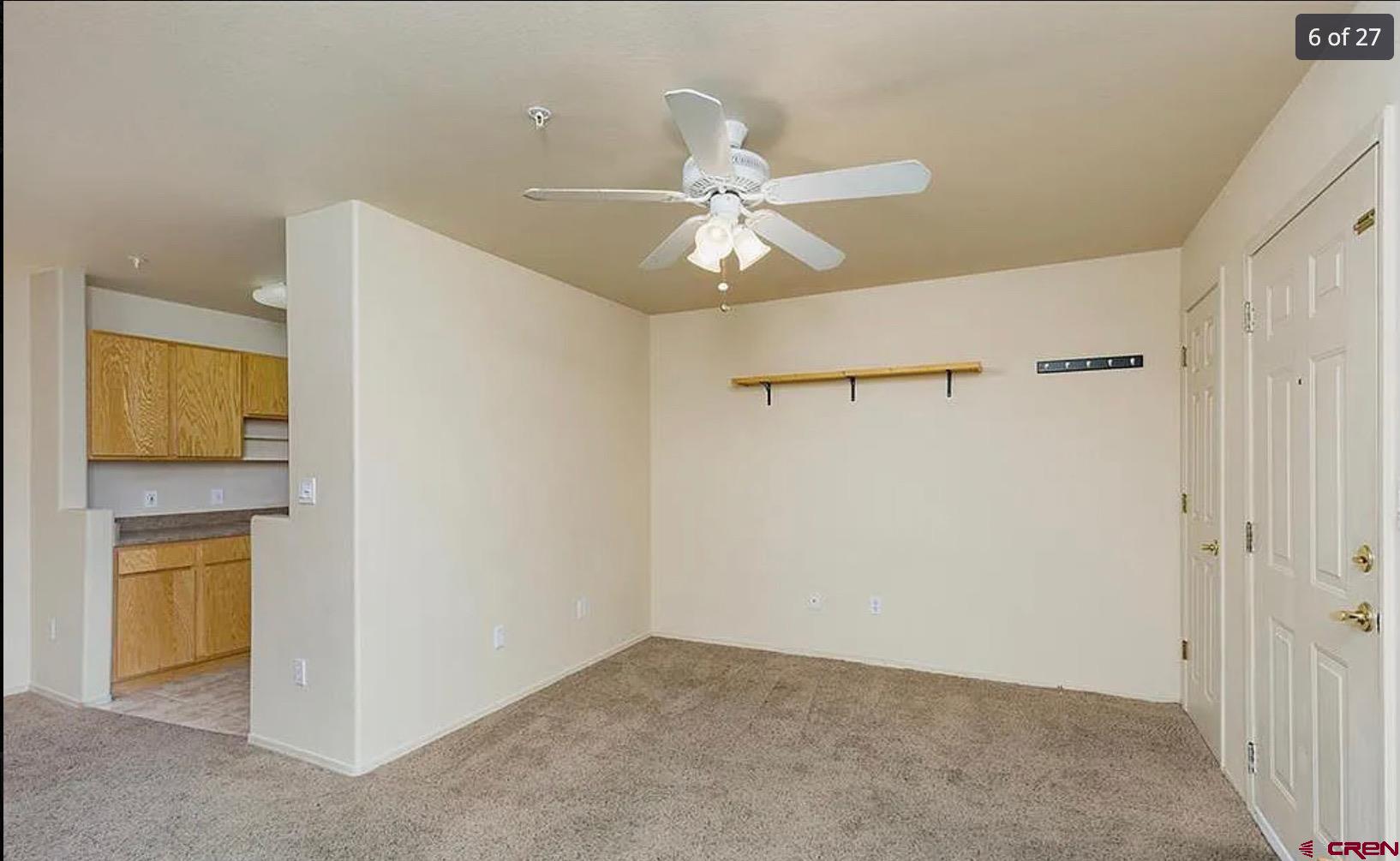 1100 Goeglein Gulch Road, Unit 167 Durango, CO 81301 - Photo 7 of 20 a view of a hallway with a chandelier fan
