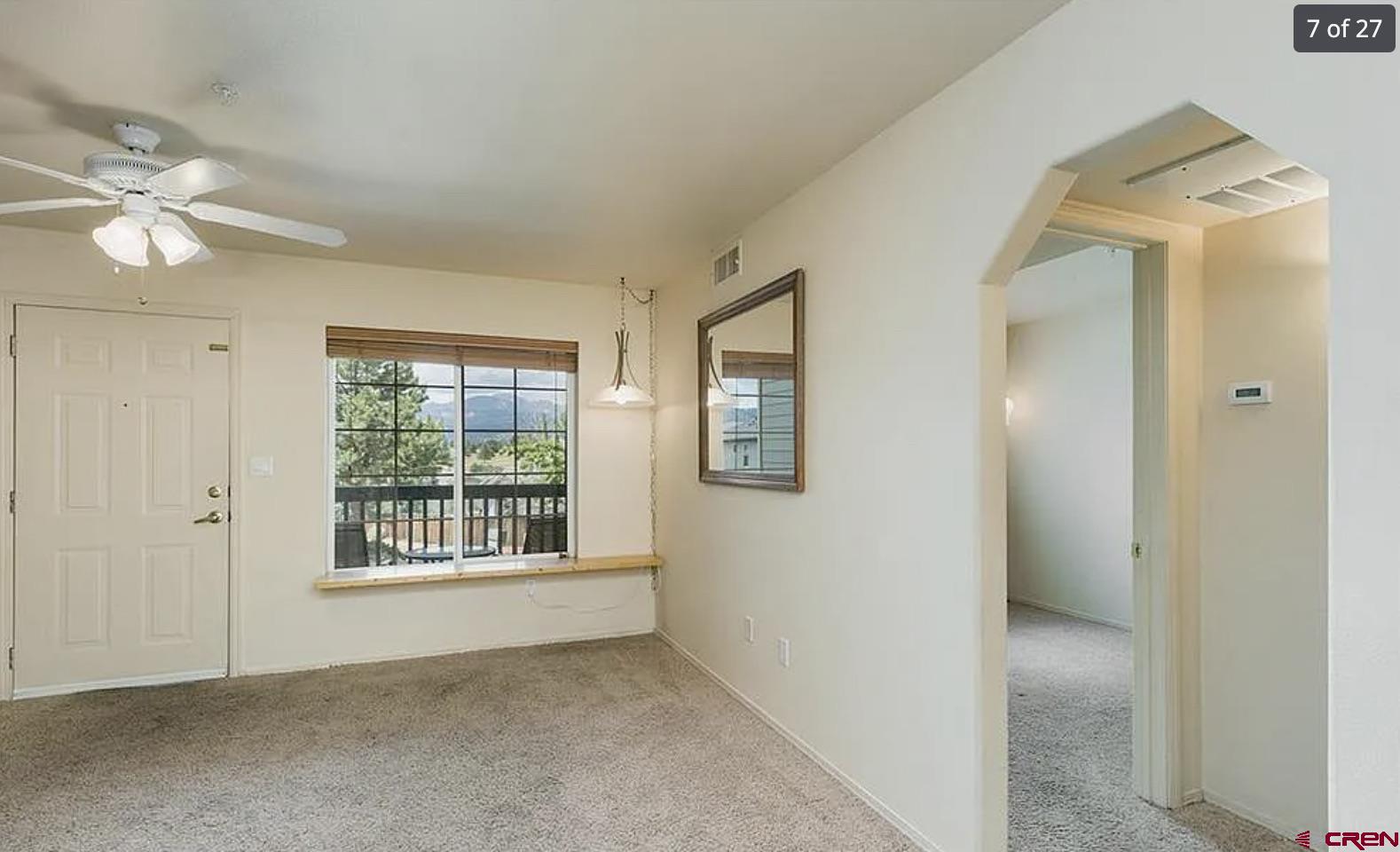 1100 Goeglein Gulch Road, Unit 167 Durango, CO 81301 - Photo 8 of 20 a view of an empty room with a window