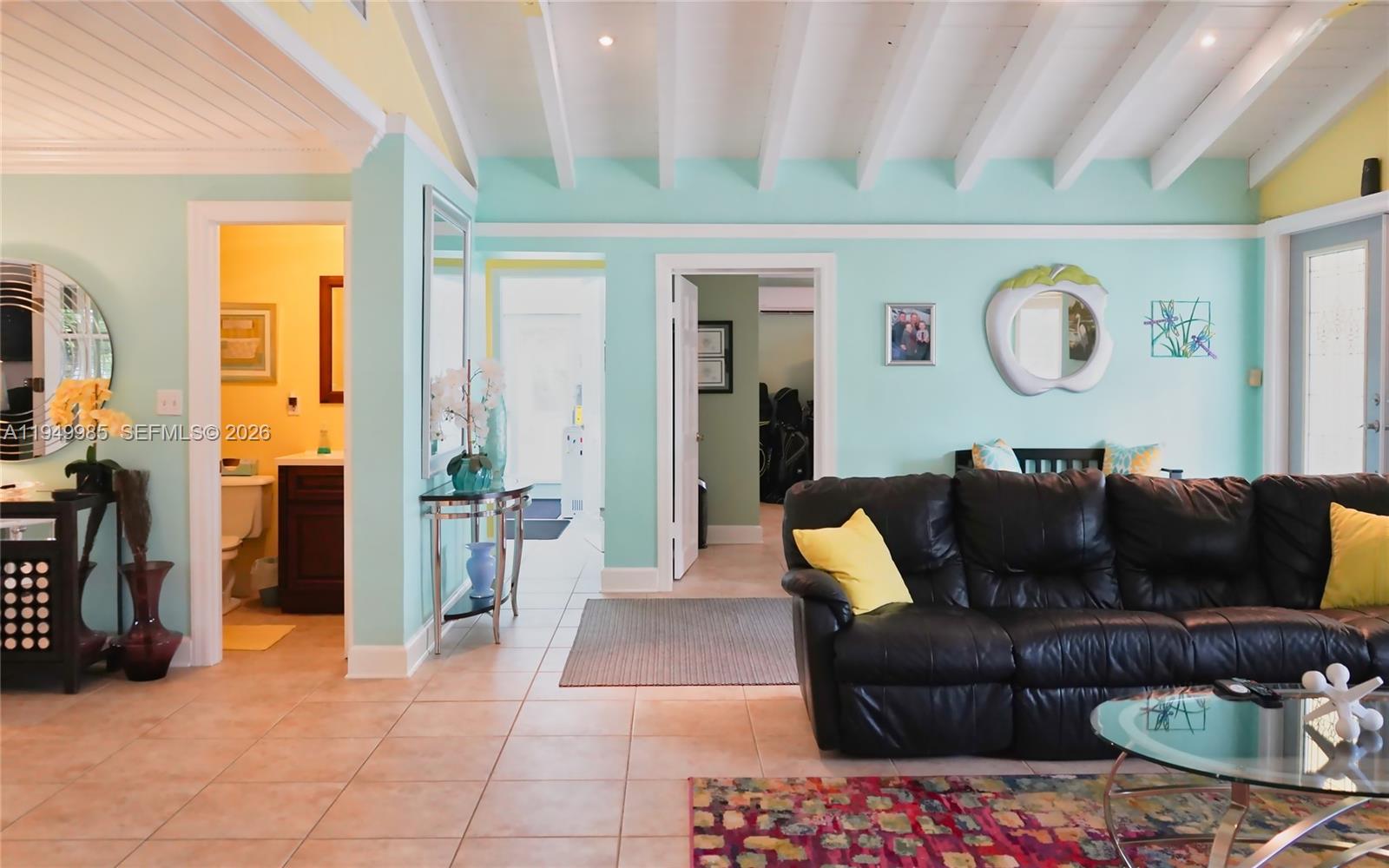 19280 Southwest 304th Street Homestead, FL 33030 - Photo 11 of 57 a living room with furniture and a fireplace