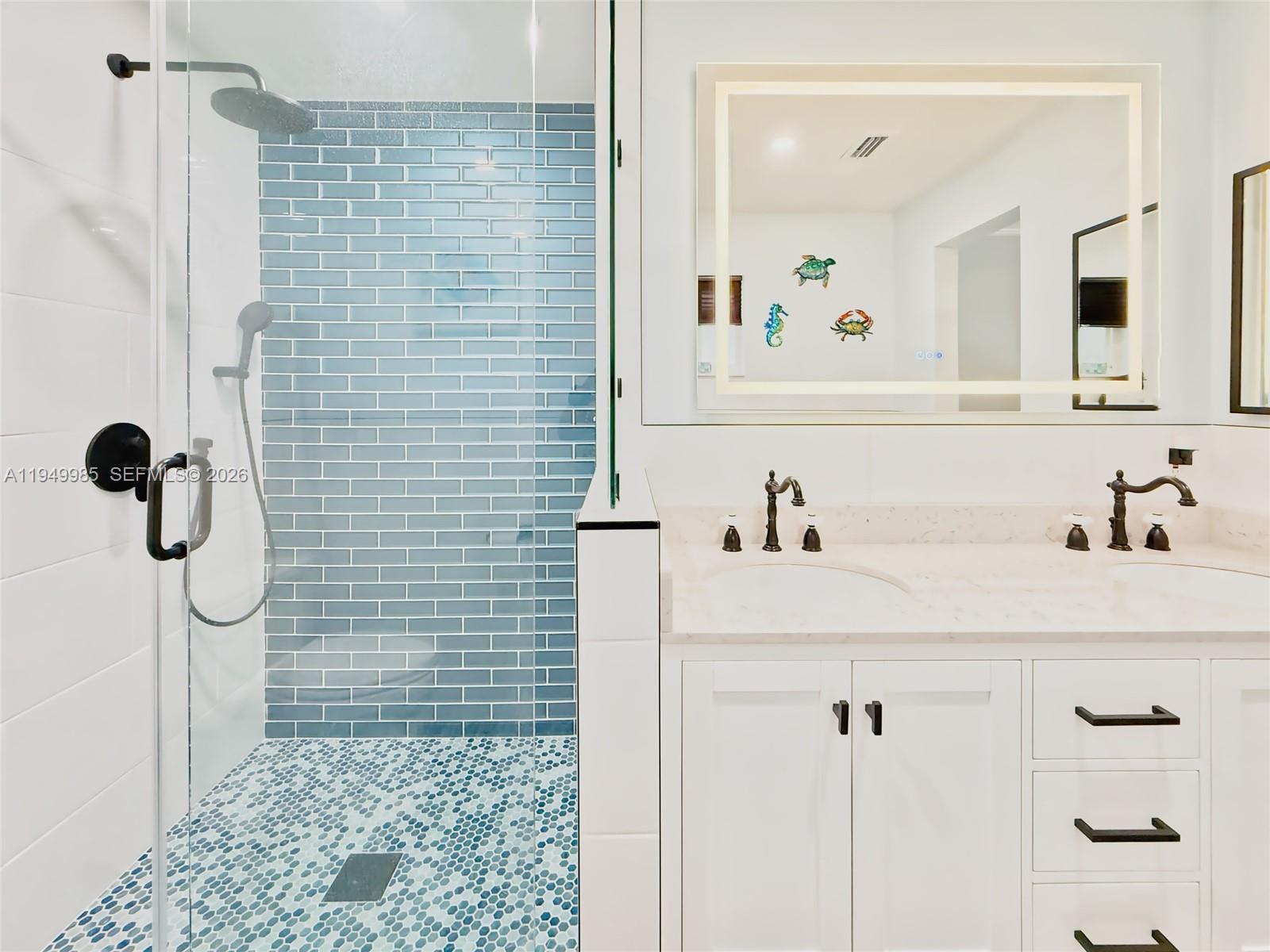 19280 Southwest 304th Street Homestead, FL 33030 - Photo 23 of 57 a bathroom with a shower