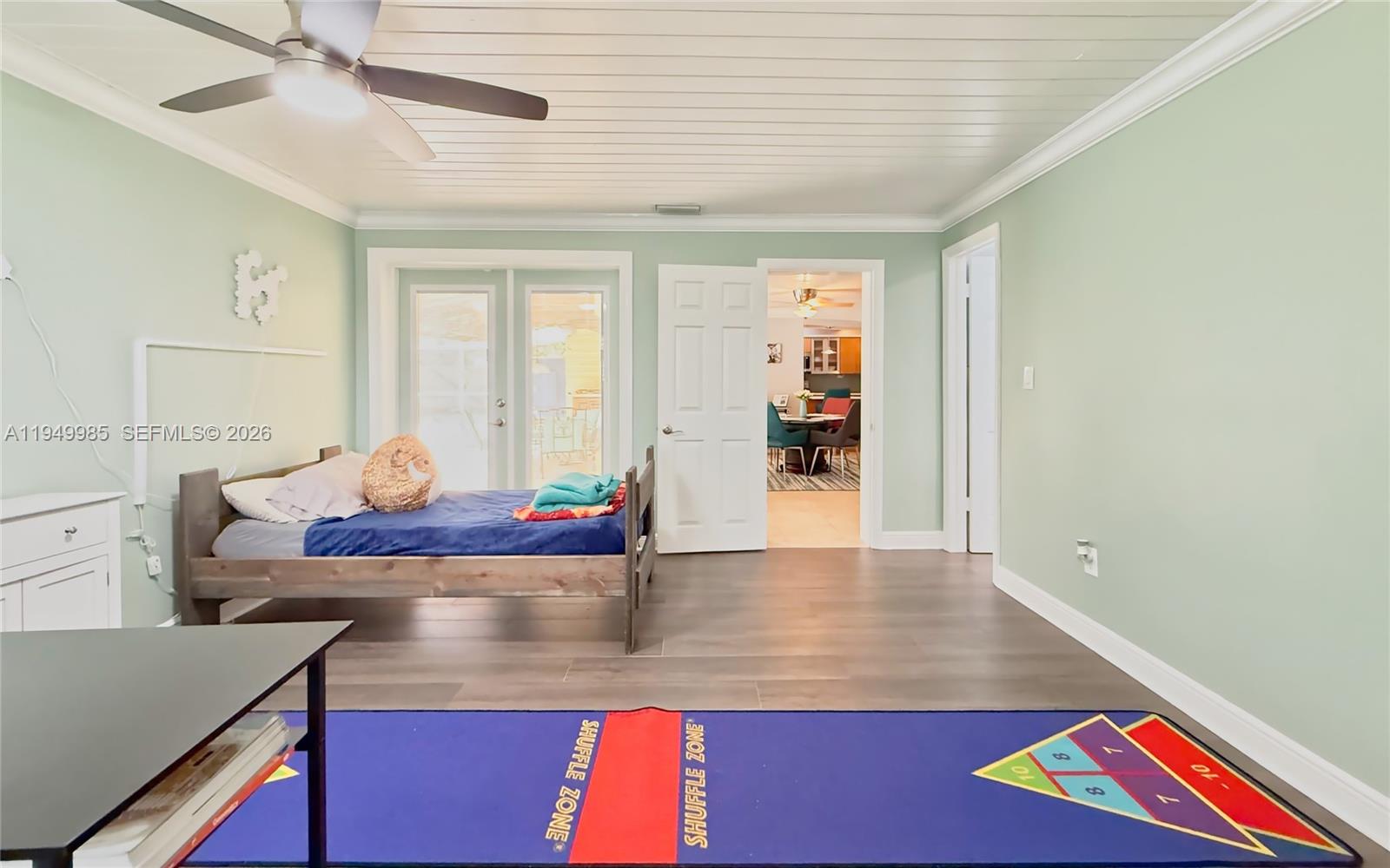 19280 Southwest 304th Street Homestead, FL 33030 - Photo 33 of 57 a living room with furniture and wooden floor
