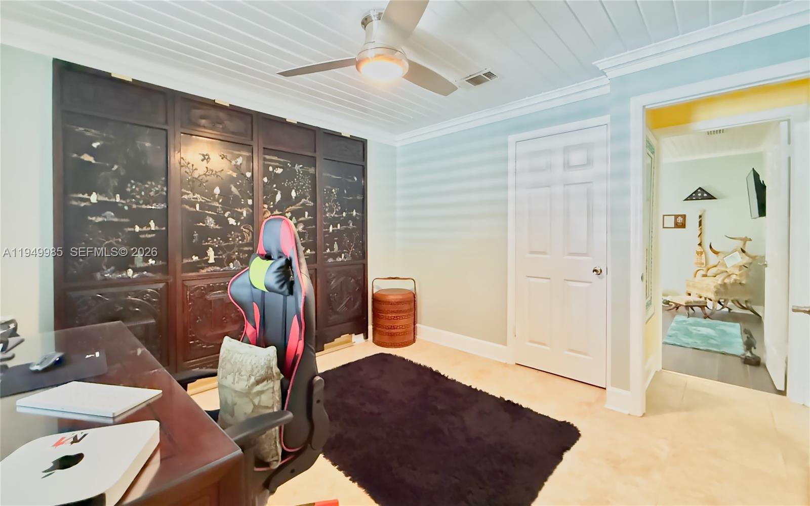 19280 Southwest 304th Street Homestead, FL 33030 - Photo 36 of 57 a workspace room with furniture and window