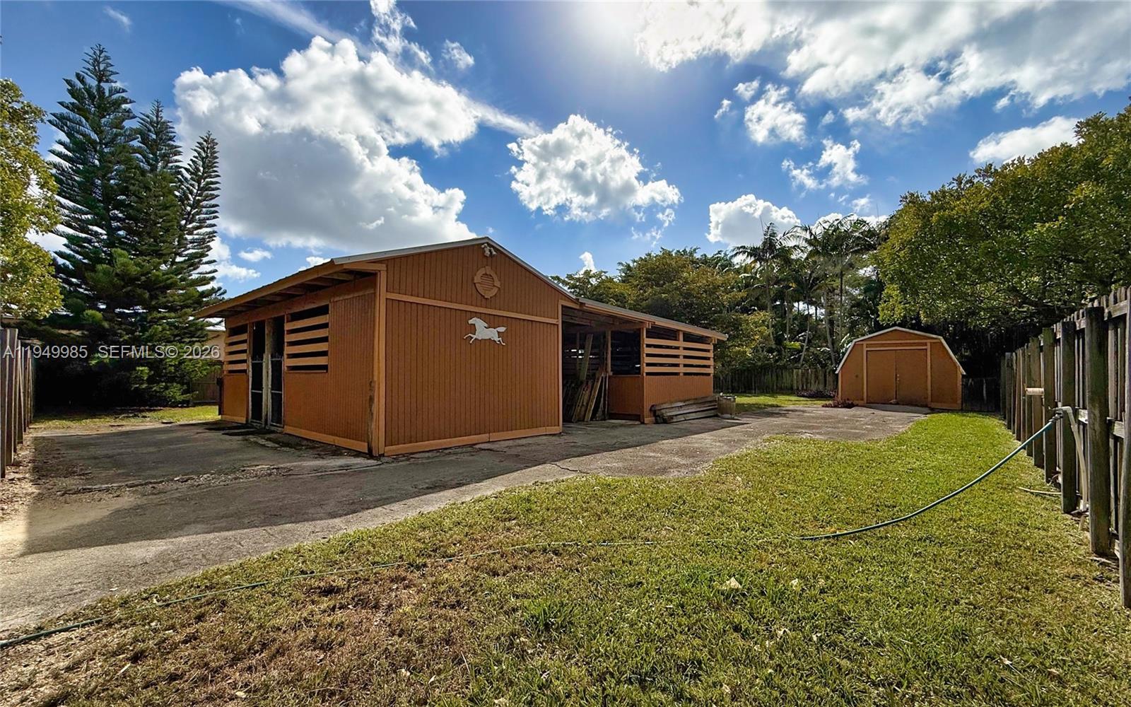 19280 Southwest 304th Street Homestead, FL 33030 - Photo 48 of 57 a view of a backyard of the house