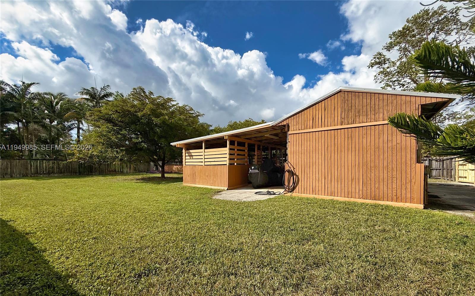 19280 Southwest 304th Street Homestead, FL 33030 - Photo 50 of 57 a view of a backyard