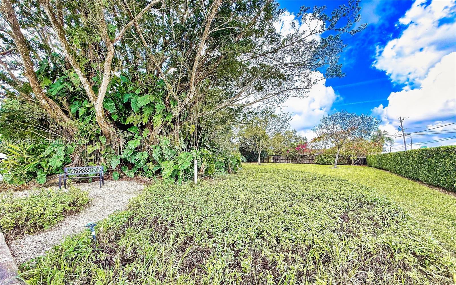 19280 Southwest 304th Street Homestead, FL 33030 - Photo 7 of 57 a view of backyard with green space