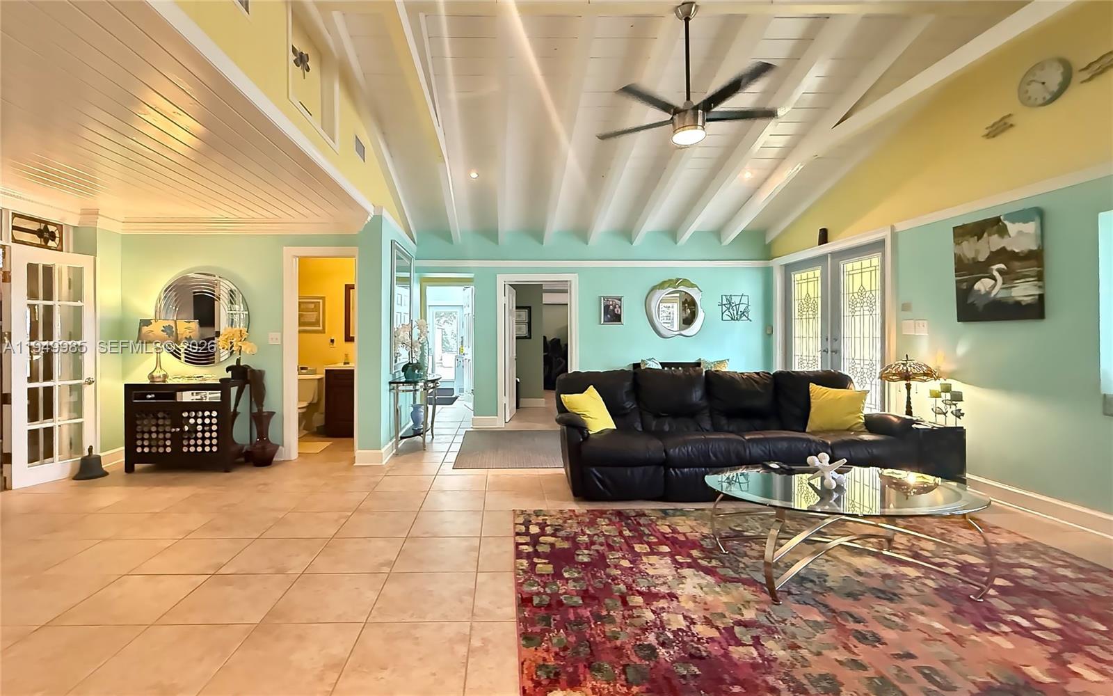 19280 Southwest 304th Street Homestead, FL 33030 - Photo 10 of 57 a living room with furniture and a large window