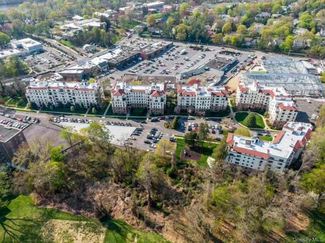 a view of a chair and tables in patio