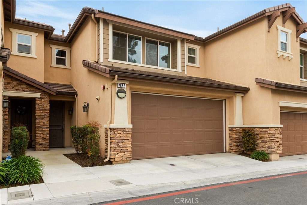 7866 Marbil Lane Riverside, CA 92504 - Photo 1 of 1 a front view of a house with a garage