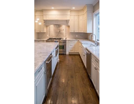 45 Indian Ridge Road Newton, MA 02459 - Photo 4 of 9 a kitchen with stainless steel appliances granite countertop a sink and a stove