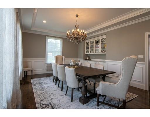 45 Indian Ridge Road Newton, MA 02459 - Photo 5 of 9 a view of a dining room with furniture and chandelier