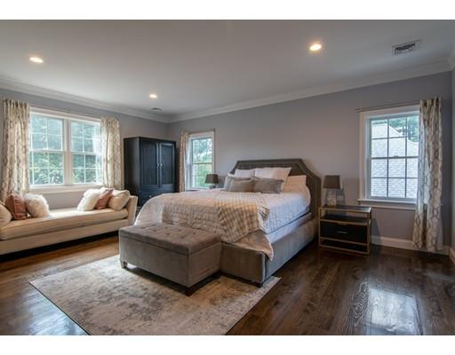 45 Indian Ridge Road Newton, MA 02459 - Photo 7 of 9 a bedroom with a bed and wooden floor