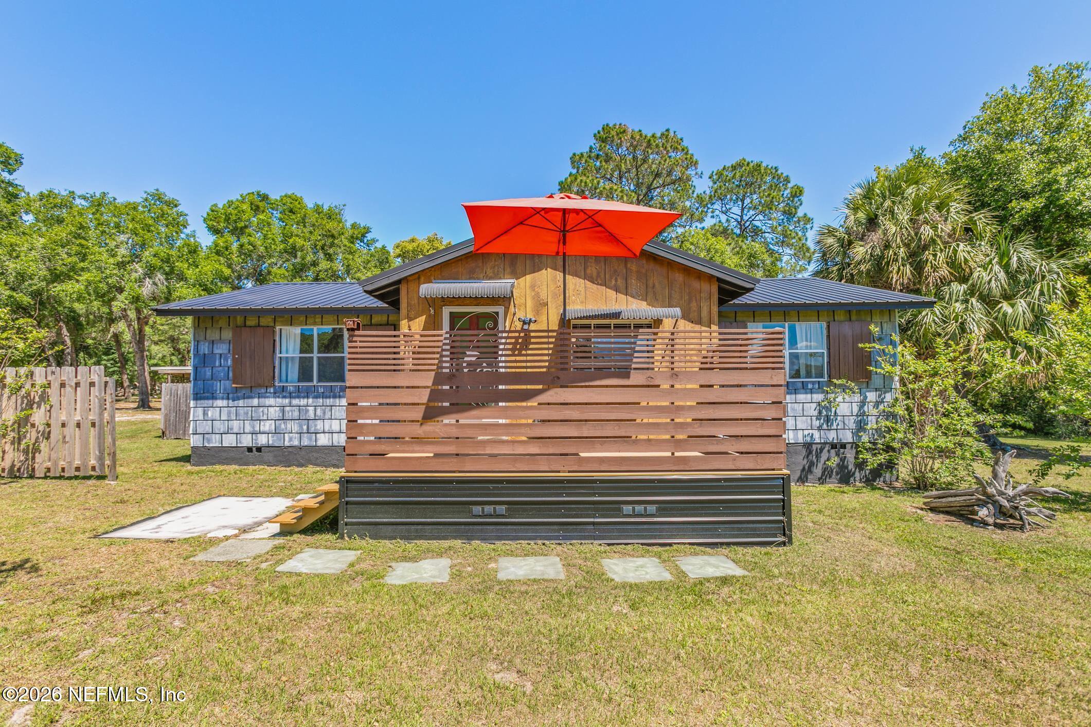 958-954 Grand Rondo Crescent City, FL 32112 - Photo 2 of 29 a view of a house with a yard