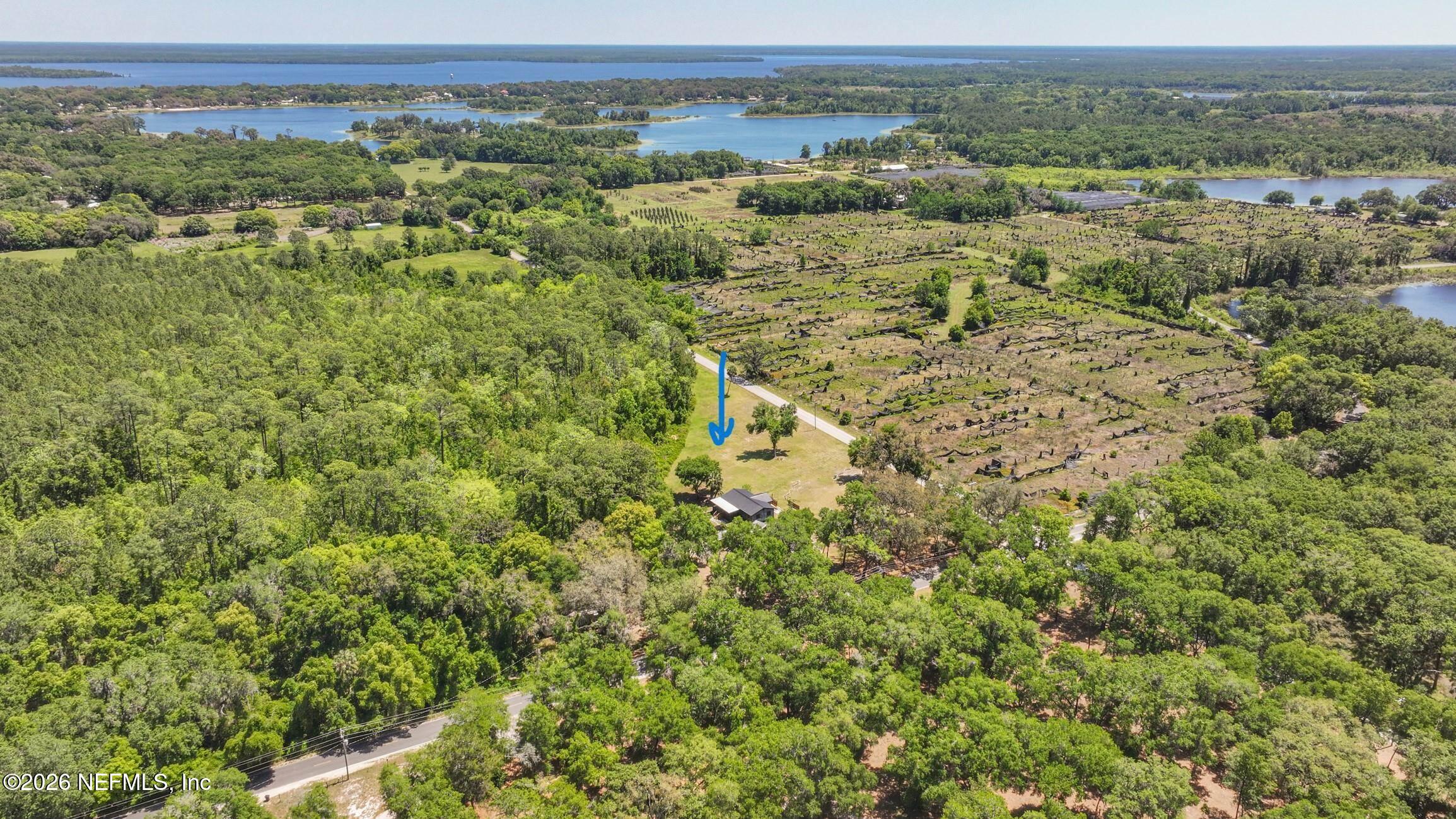 958-954 Grand Rondo Crescent City, FL 32112 - Photo 3 of 29 an aerial view of a houses with yard