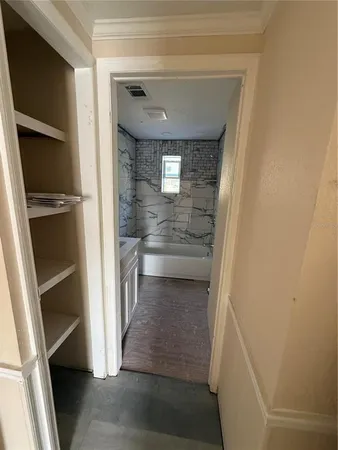 an empty room with windows