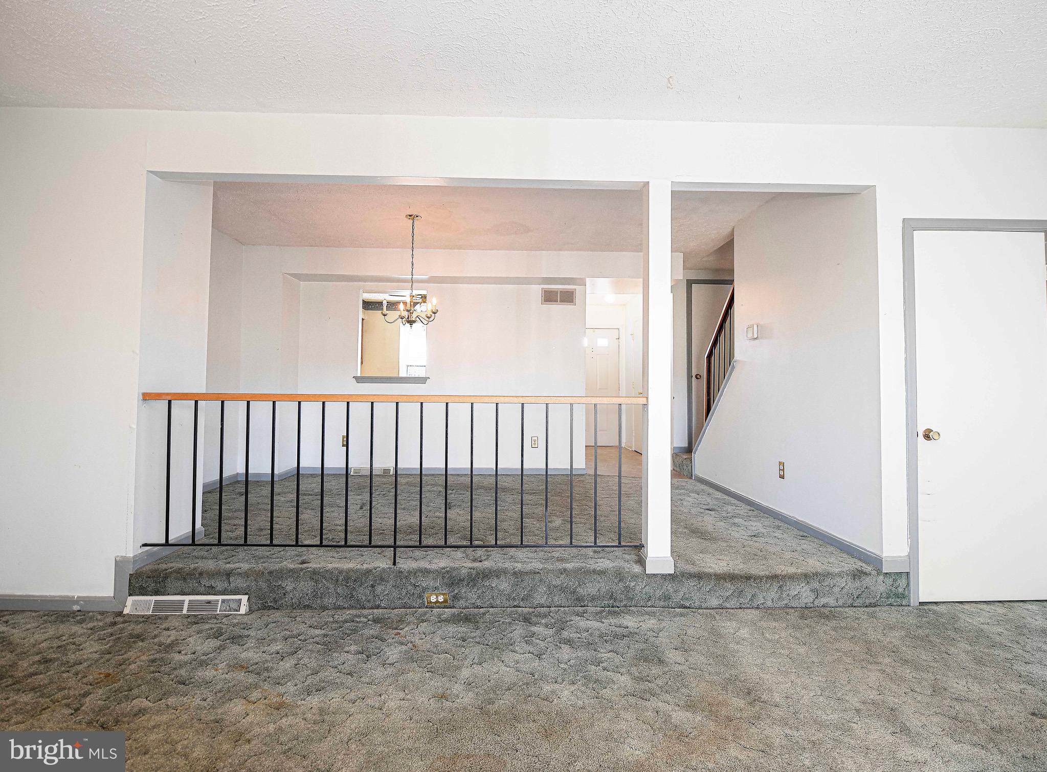 2916 Carlyle Court Abingdon, MD 21009 - Photo 17 of 30 Step down from dining room into living room