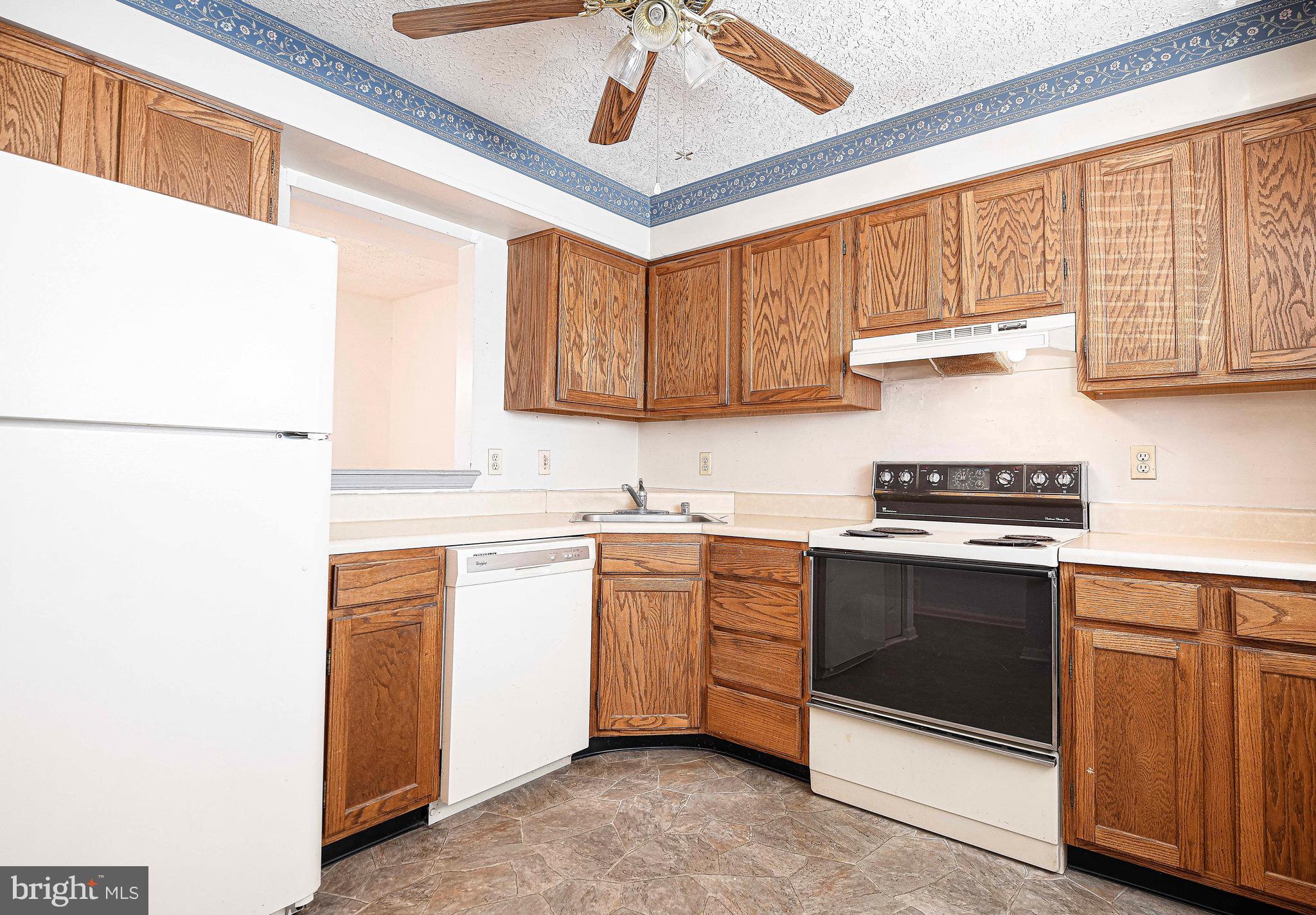 2916 Carlyle Court Abingdon, MD 21009 - Photo 8 of 30 White appliances & oak cabinets