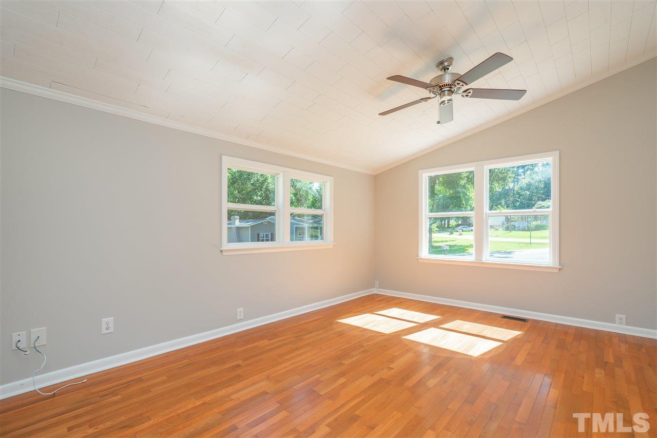 1500 Kelly Road Garner, NC 27529 - Photo 14 of 21 a view of a big room with wooden floor and windows in a room