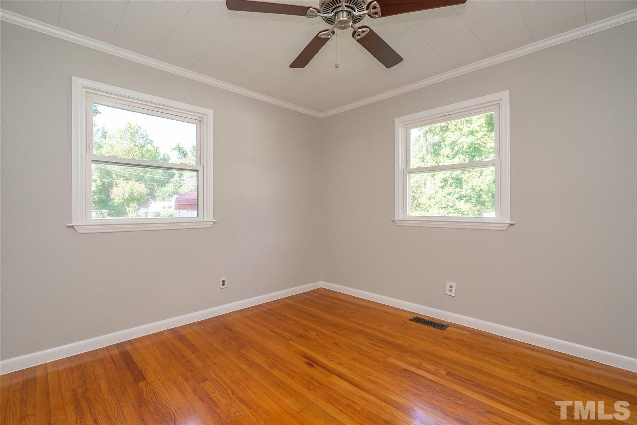 1500 Kelly Road Garner, NC 27529 - Photo 9 of 21 a view of room with hardwood floor and window