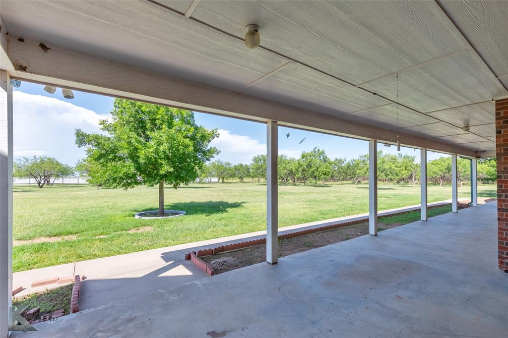 13063 Rainey Ridge Lane Abilene, TX 79602 - Photo 12 of 40 a view of a garden with an outdoor seating