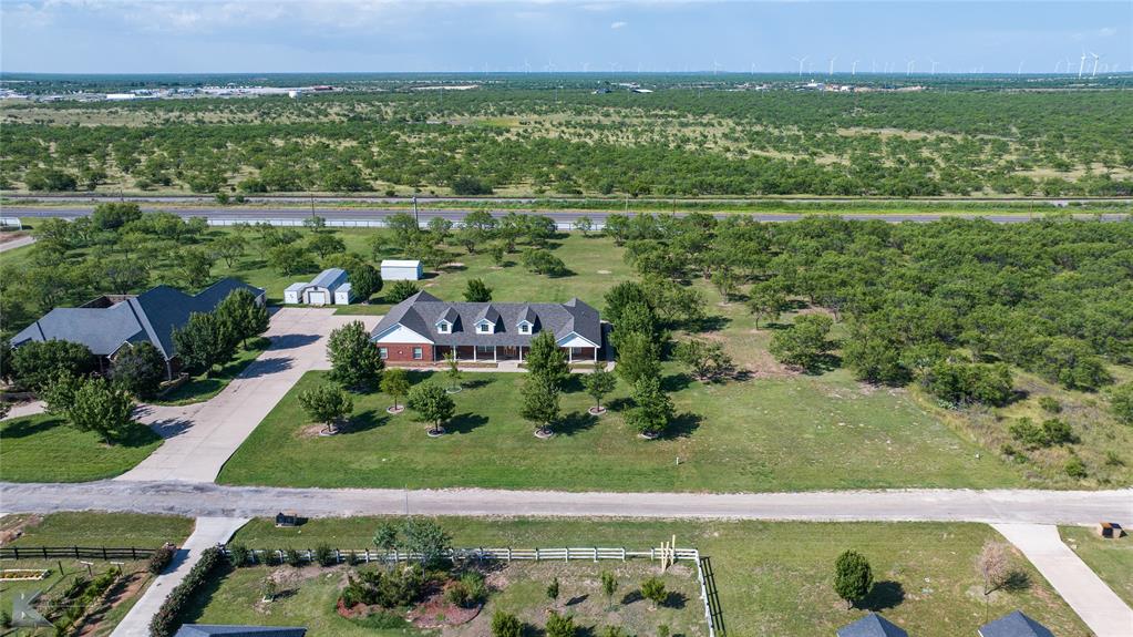 13063 Rainey Ridge Lane Abilene, TX 79602 - Photo 32 of 40 an aerial view of a house with a yard