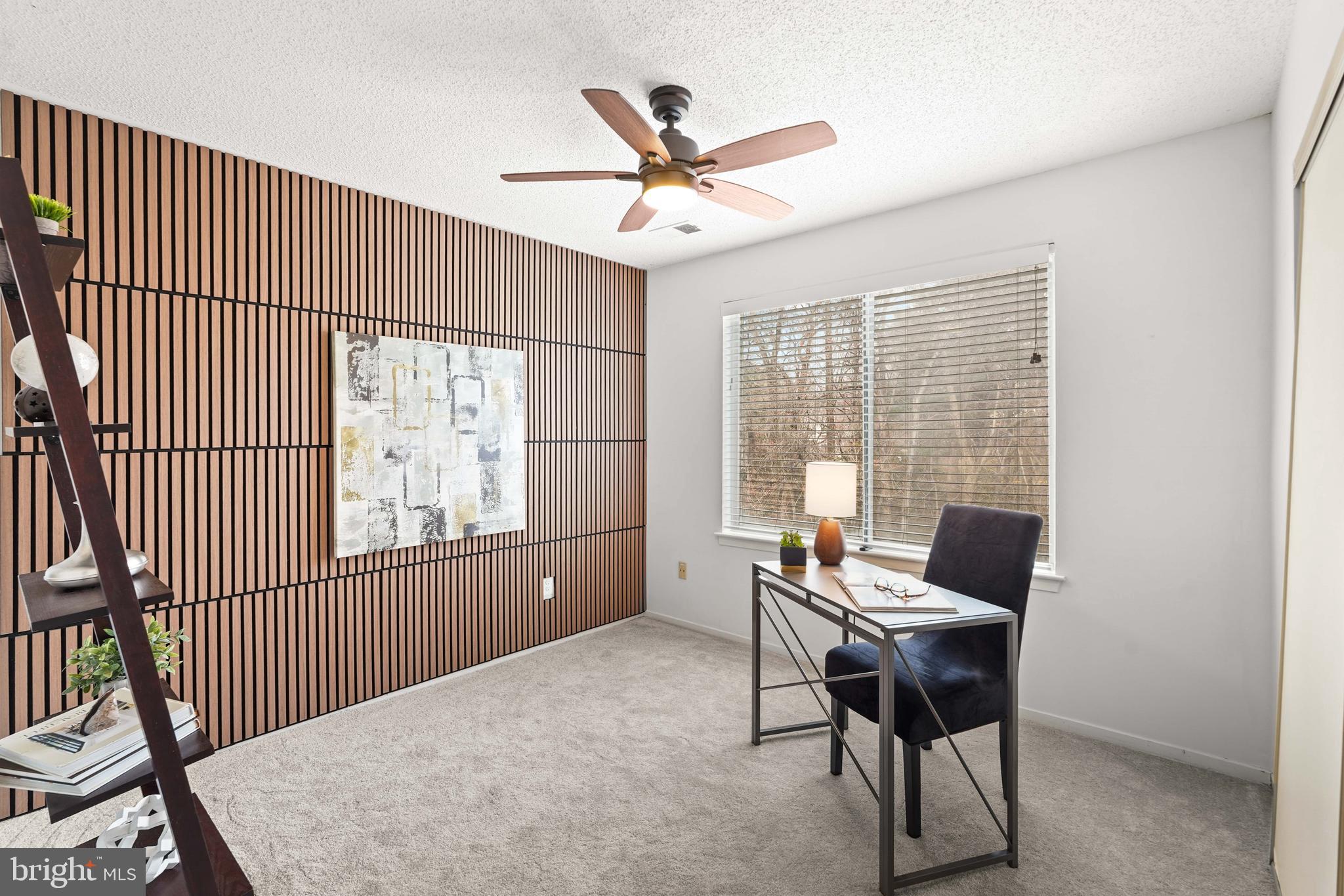 11731 Summerchase Circle, Unit 1731E Reston, VA 20194 - Photo 18 of 30 a workspace with wooden floor and a window