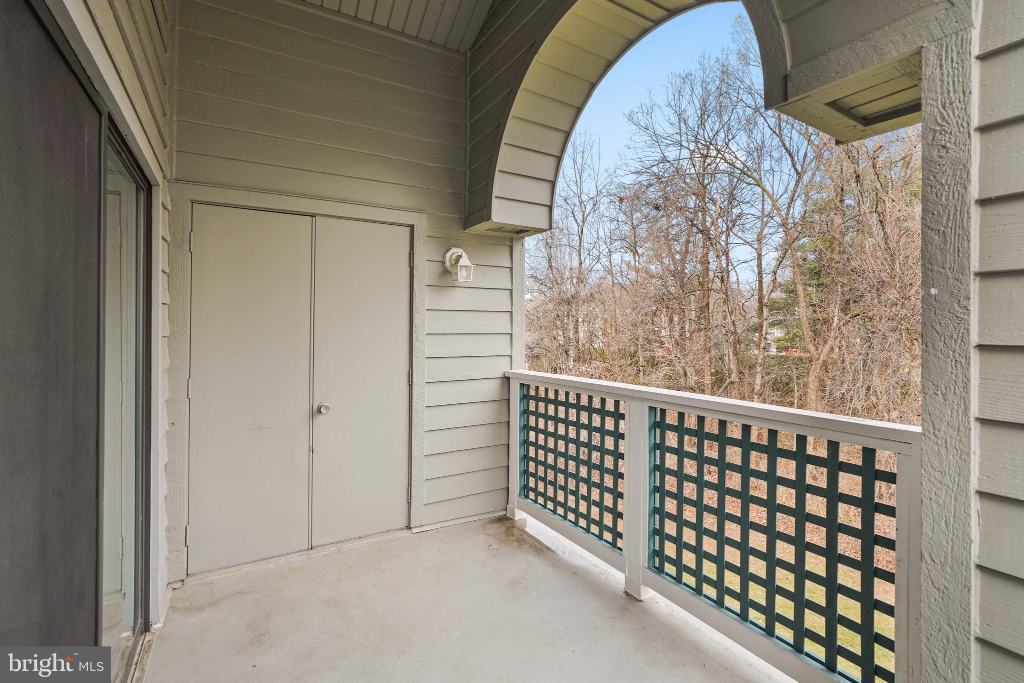 11731 Summerchase Circle, Unit 1731E Reston, VA 20194 - Photo 23 of 30 a view of a porch