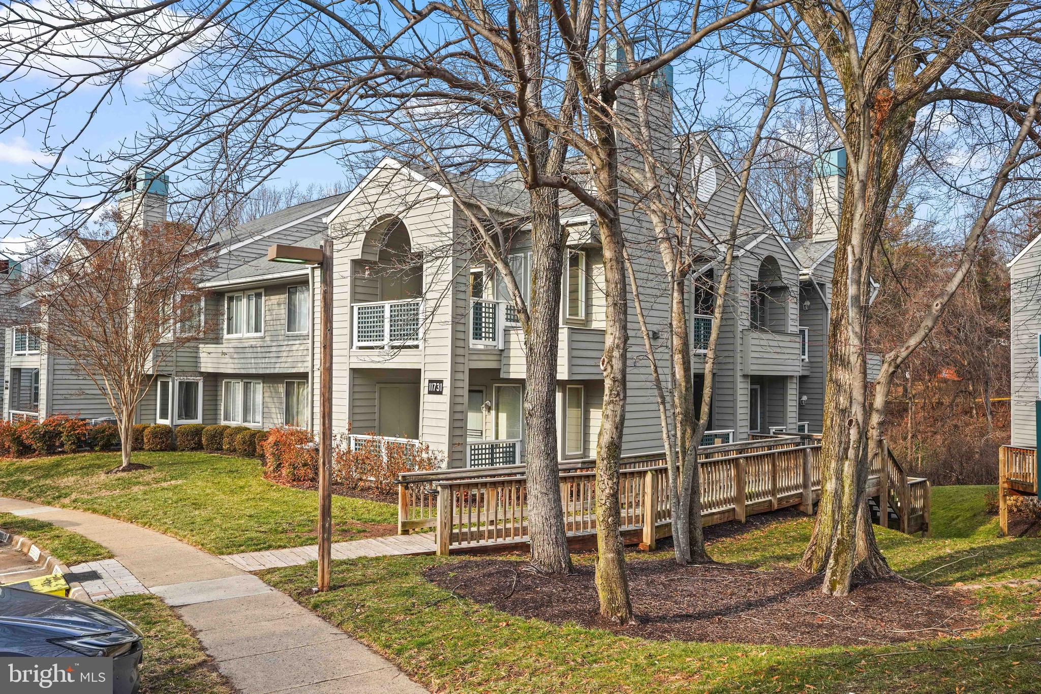 11731 Summerchase Circle, Unit 1731E Reston, VA 20194 - Photo 25 of 30 a front view of a house with entertaining space