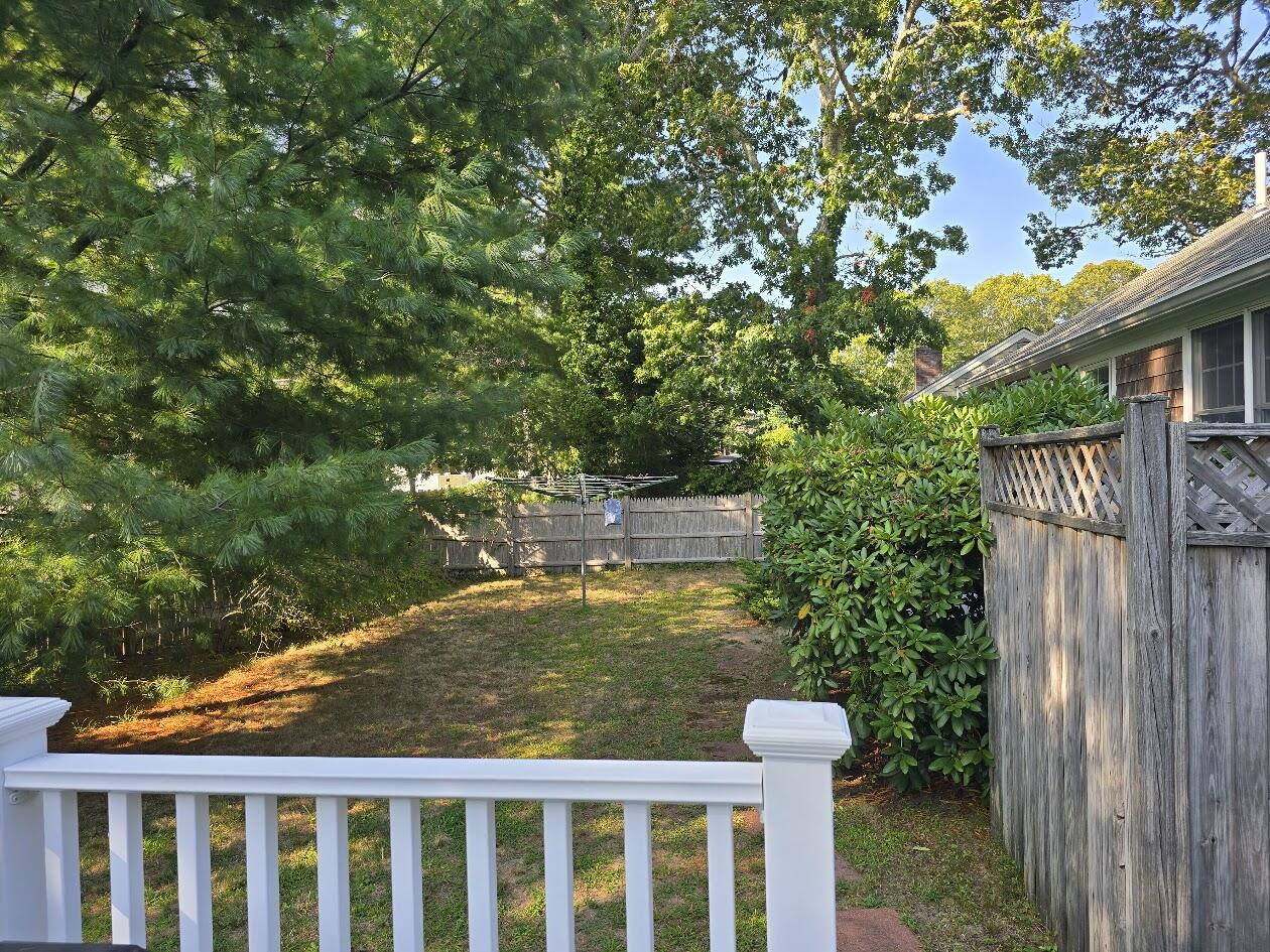 15 Woodside Park Road West Dennis, MA 02670 - Photo 29 of 35 a balcony with an outdoor space