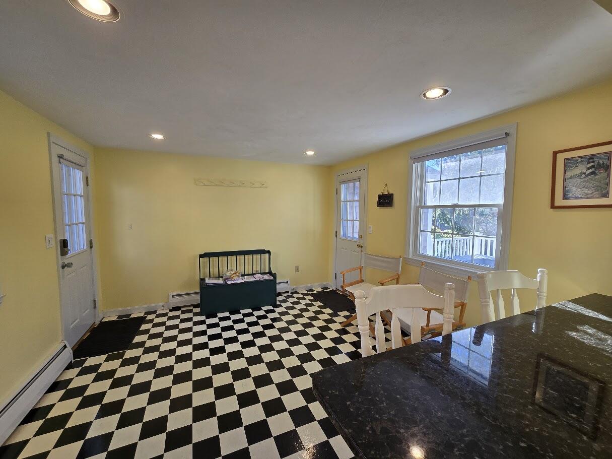 15 Woodside Park Road West Dennis, MA 02670 - Photo 9 of 35 a bedroom with a bed and wooden floor